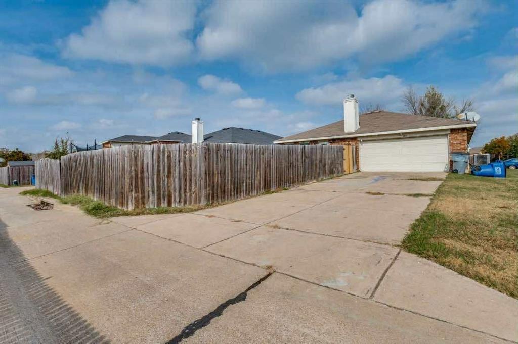 2118 Augusta Street Lancaster, TX 75146 - Photo 25 of 25 a view of backyard of house
