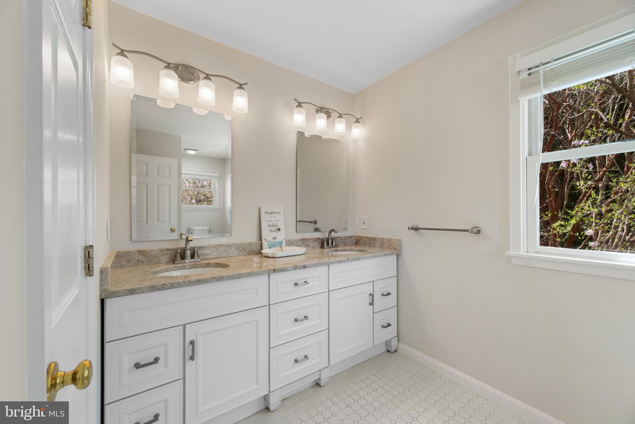 5929 Deale Beach Road Deale, MD 20751 - Photo 35 of 58 Bathroom featuring double vanity and baseboards
