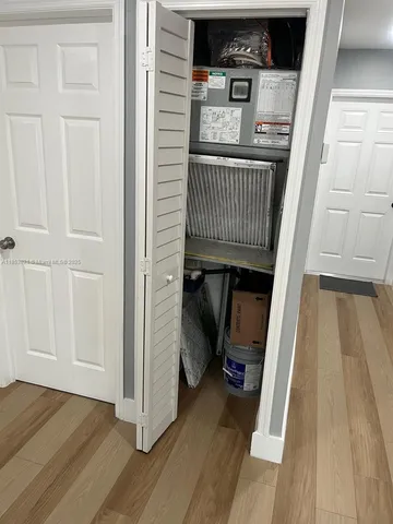 a view of a hardwood & staircase