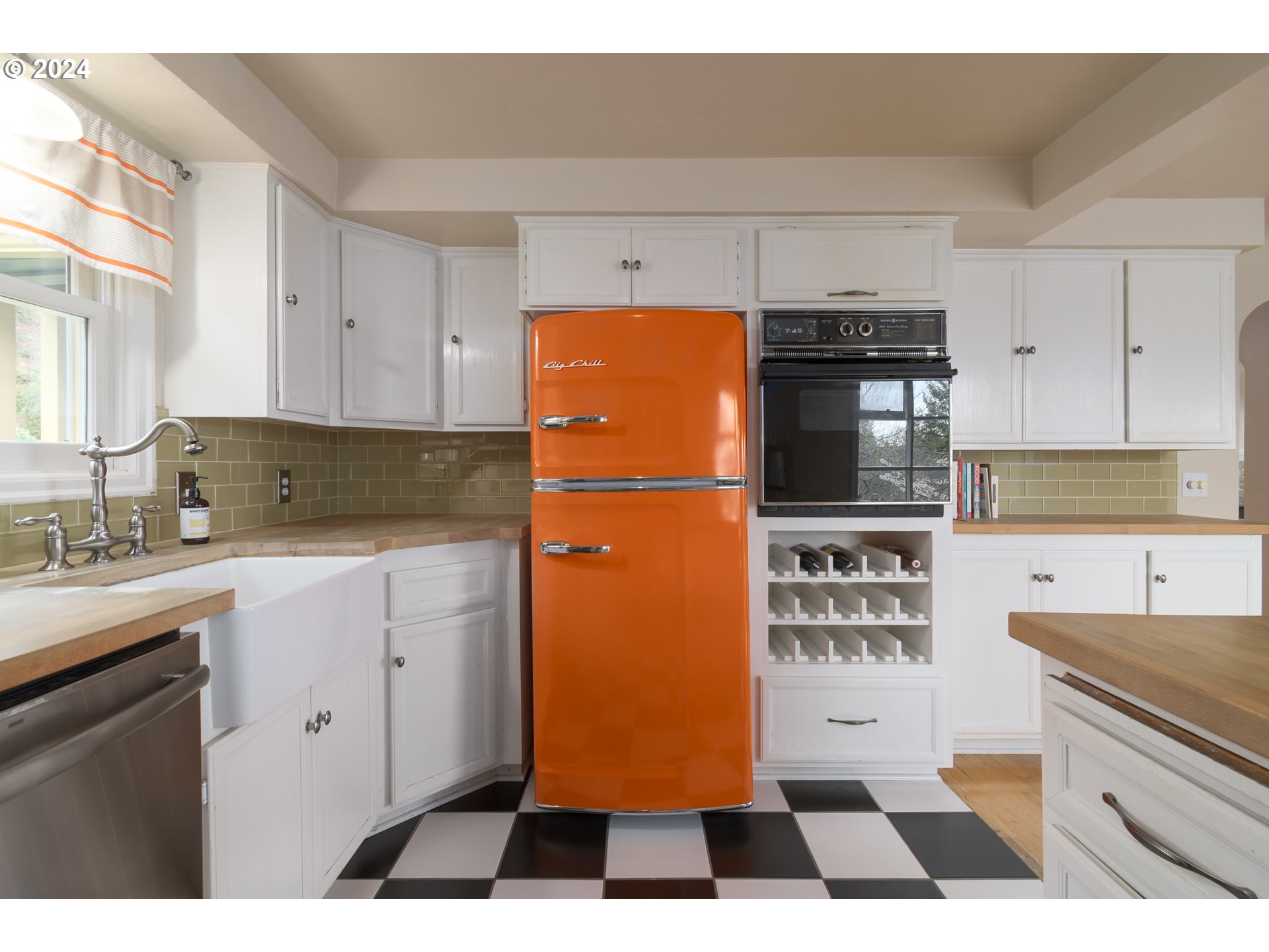 2614 Van Ness Street Eugene, OR 97403 - Photo 14 of 38 a kitchen with stainless steel appliances granite countertop a refrigerator stove and sink
