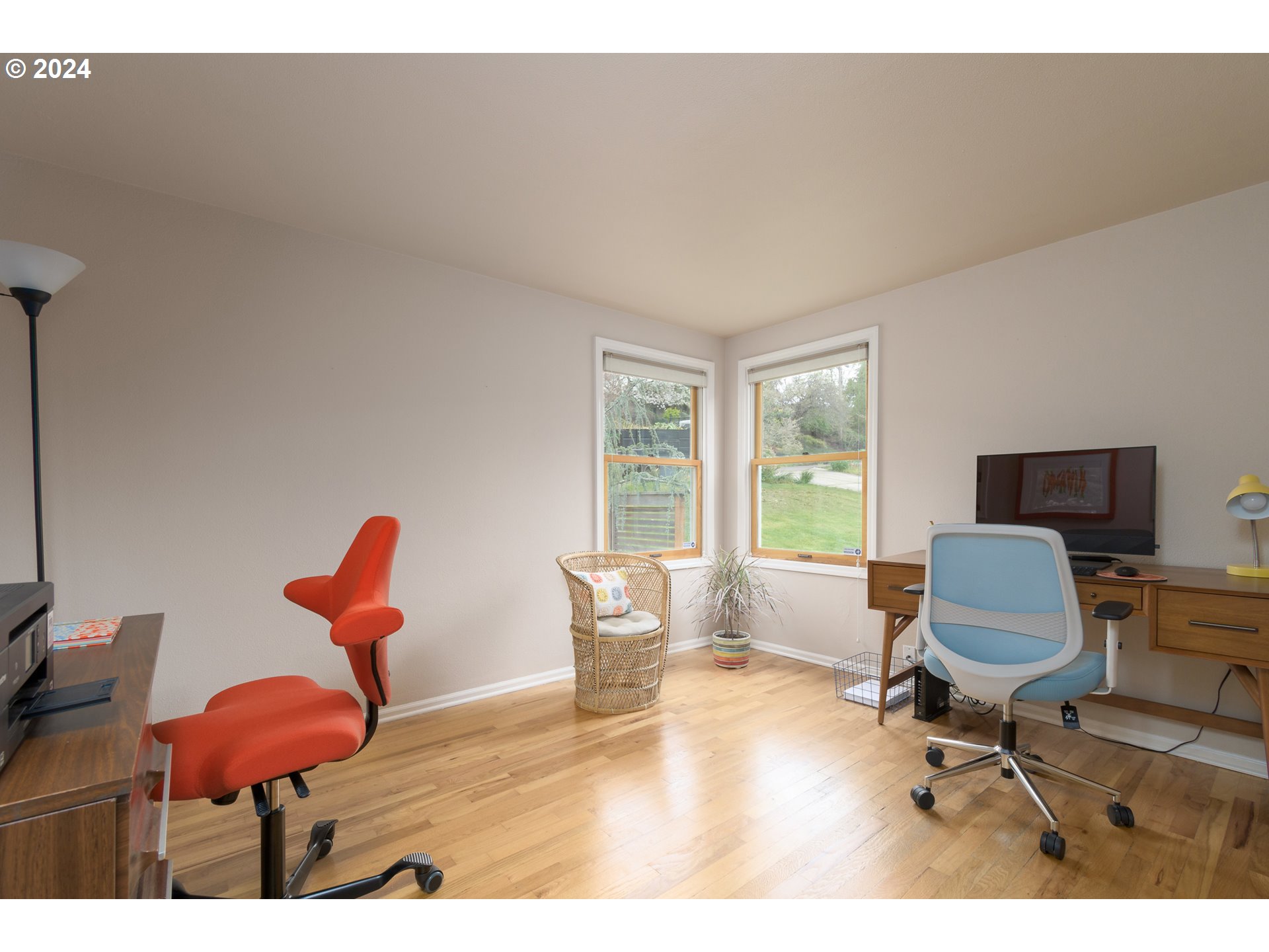 2614 Van Ness Street Eugene, OR 97403 - Photo 17 of 38 a workspace with furniture hardwood and a window