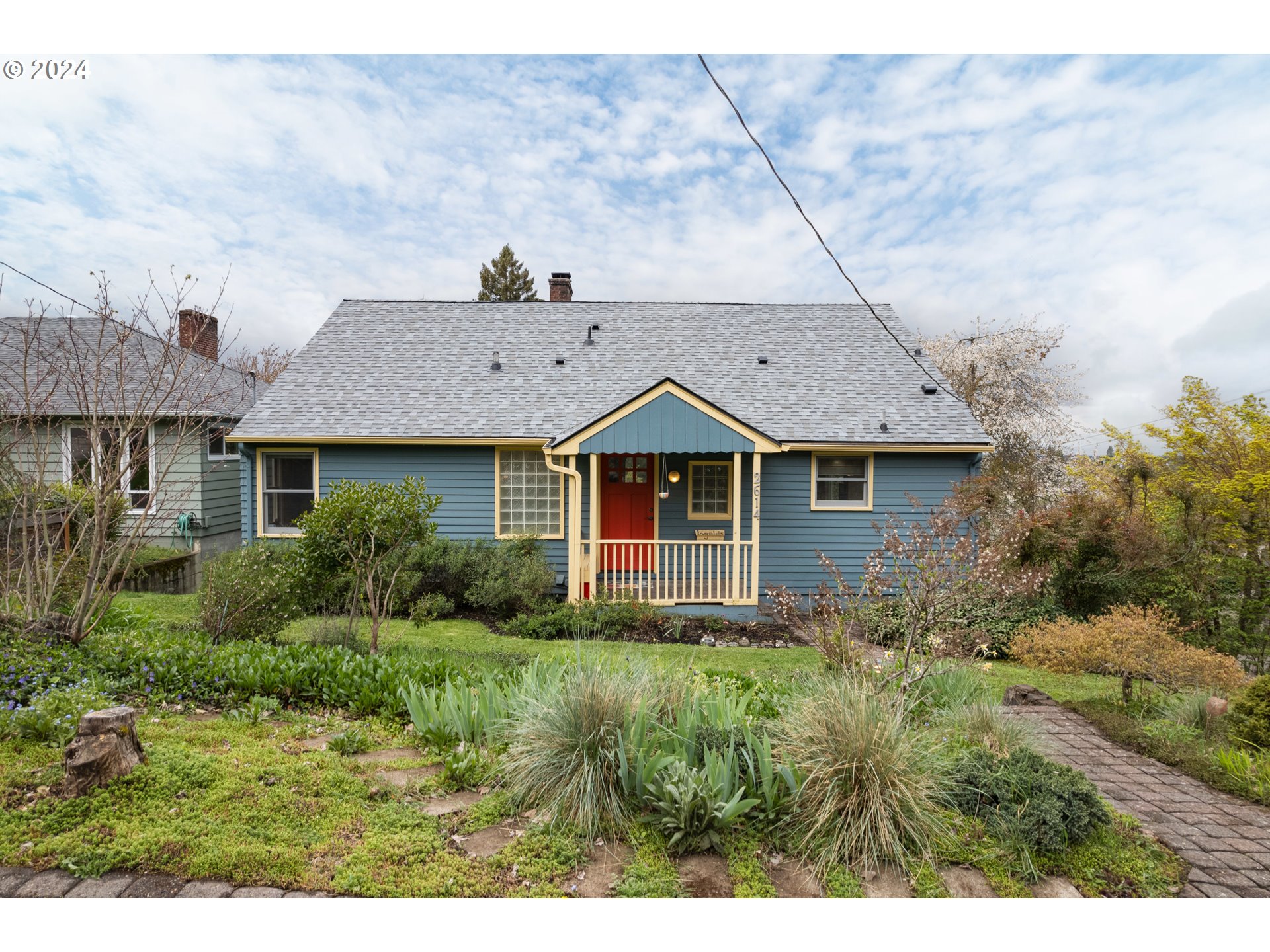 2614 Van Ness Street Eugene, OR 97403 - Photo 2 of 38 a aerial view of a house with a yard and plants