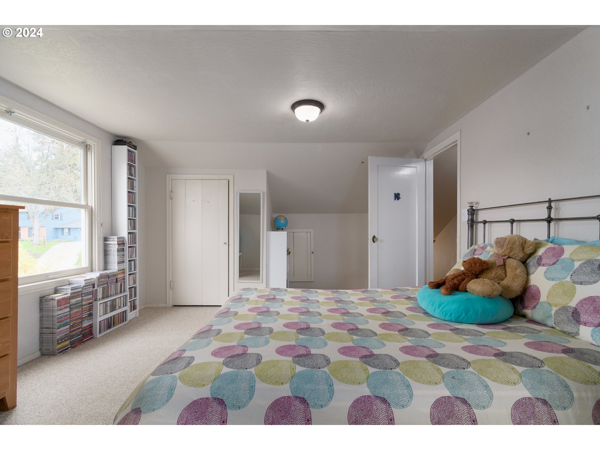 2614 Van Ness Street Eugene, OR 97403 - Photo 21 of 38 a bedroom with a bed and a window