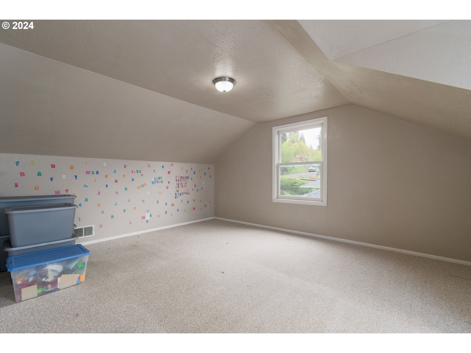 2614 Van Ness Street Eugene, OR 97403 - Photo 22 of 38 a view of an empty room with a window