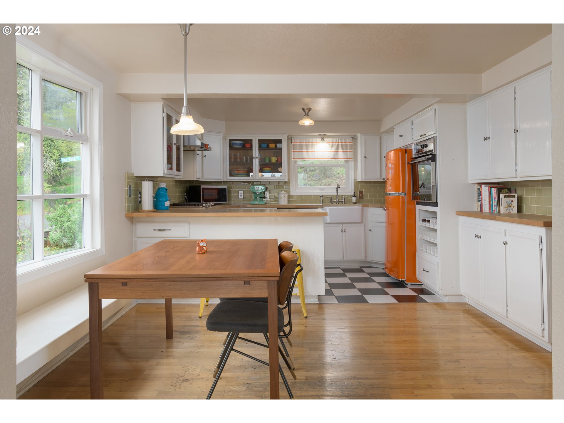 2614 Van Ness Street Eugene, OR 97403 - Photo 10 of 38 a kitchen with stainless steel appliances granite countertop a stove refrigerator and cabinets