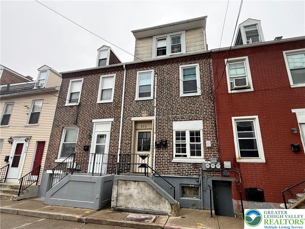 832 West Maple Street Allentown, PA 18101 - Photo 1 of 7 a front view of a house with a yard