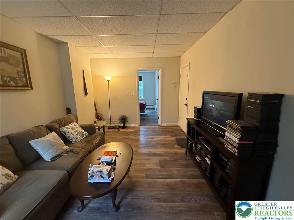832 West Maple Street Allentown, PA 18101 - Photo 4 of 7 a living room with furniture and a flat screen tv