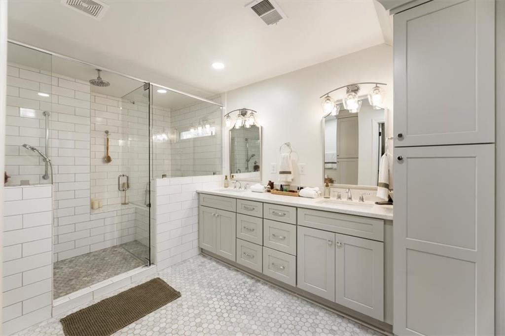 2415 Roxburgh Drive Roswell, GA 30076 - Photo 29 of 62 a bathroom with a double vanity sink mirror and double