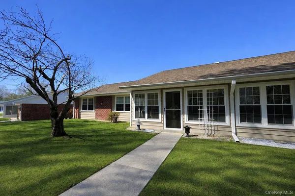 $369,000 | 64 Enfield Court, Unit A, Ridge, NY 11961