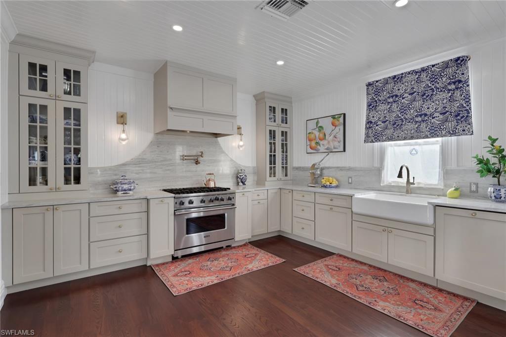 2582 First Street Fort Myers, FL 33901 - Photo 14 of 35 a kitchen with a sink cabinets and window