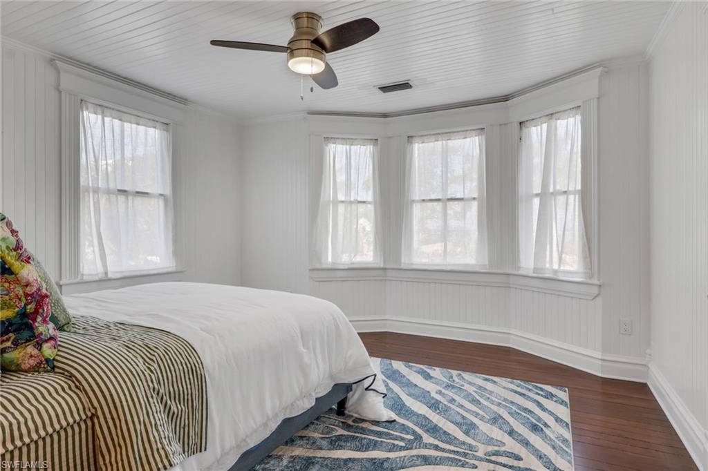 2582 First Street Fort Myers, FL 33901 - Photo 22 of 35 a bedroom with a bed and a window