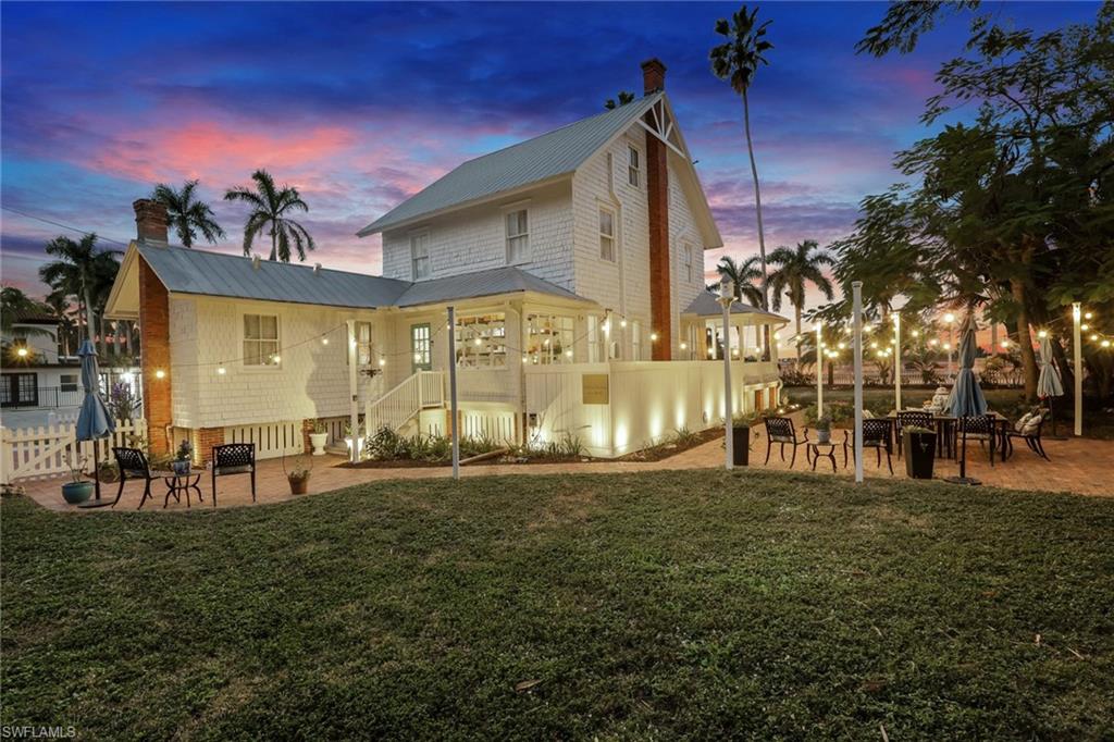 2582 First Street Fort Myers, FL 33901 - Photo 30 of 35 a front view of a building with outdoor seating