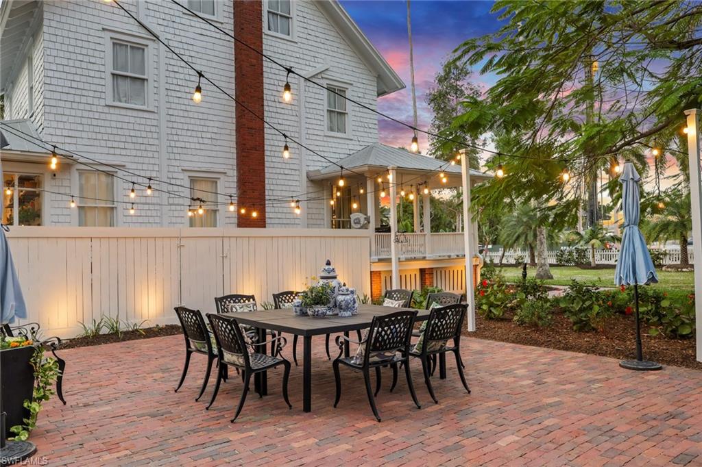 2582 First Street Fort Myers, FL 33901 - Photo 34 of 35 a view of a table and chairs in patio of the house