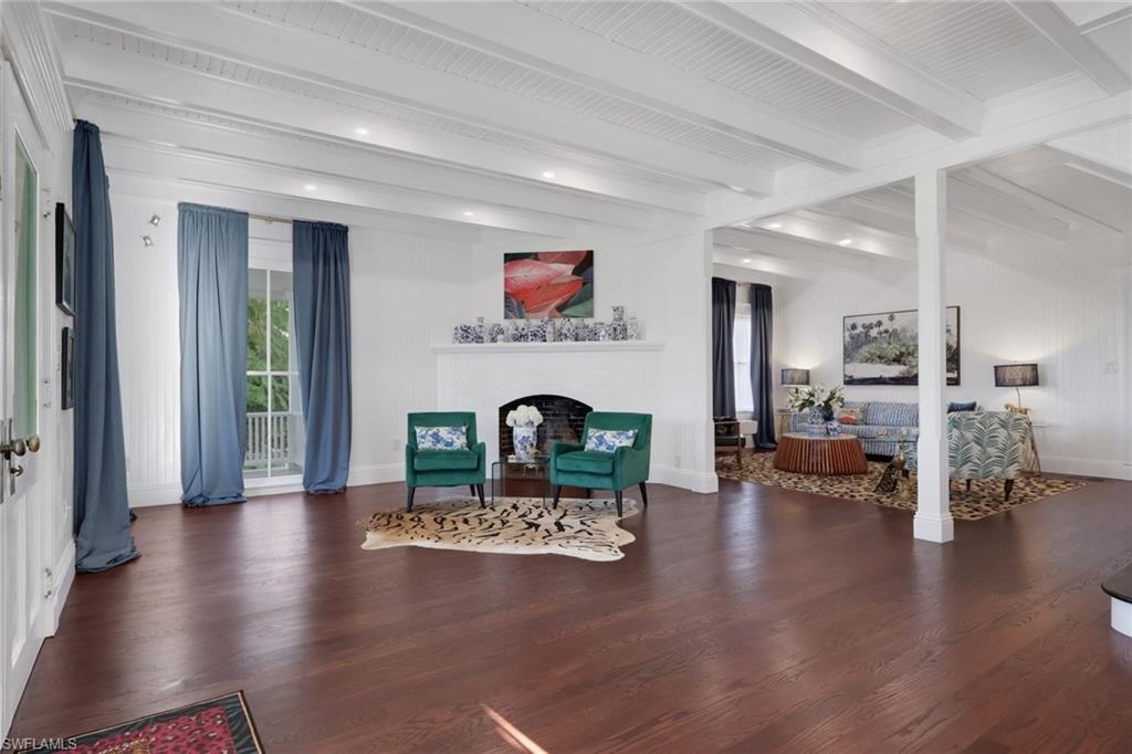 2582 First Street Fort Myers, FL 33901 - Photo 10 of 35 a living room with furniture and a fireplace