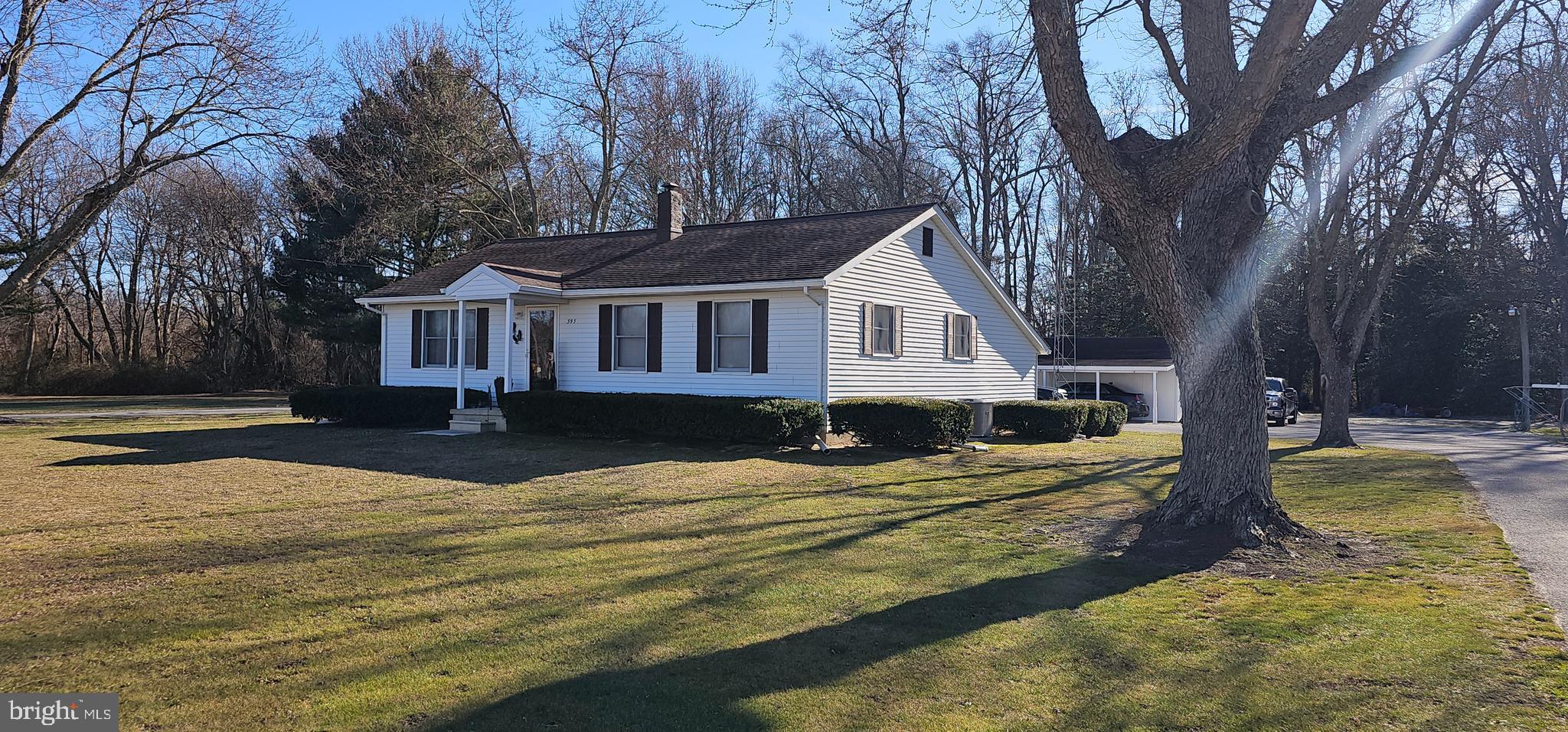 393 Newport Neck Road Newport, NJ 08345 - Photo 2 of 4 a view of a house with snow on the road