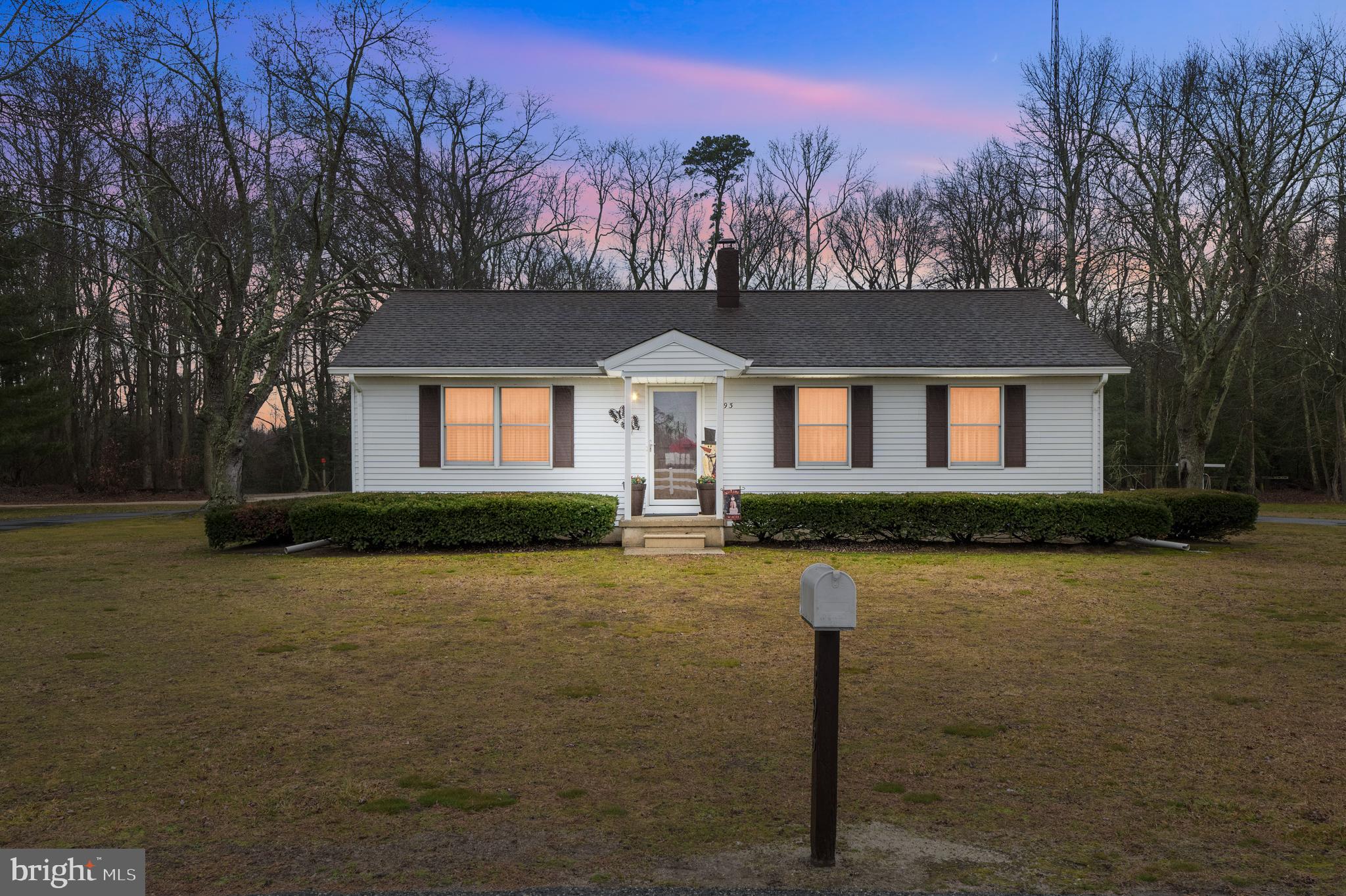 393 Newport Neck Road Newport, NJ 08345 - Photo 23 of 24 a front view of a house with a yard and garage
