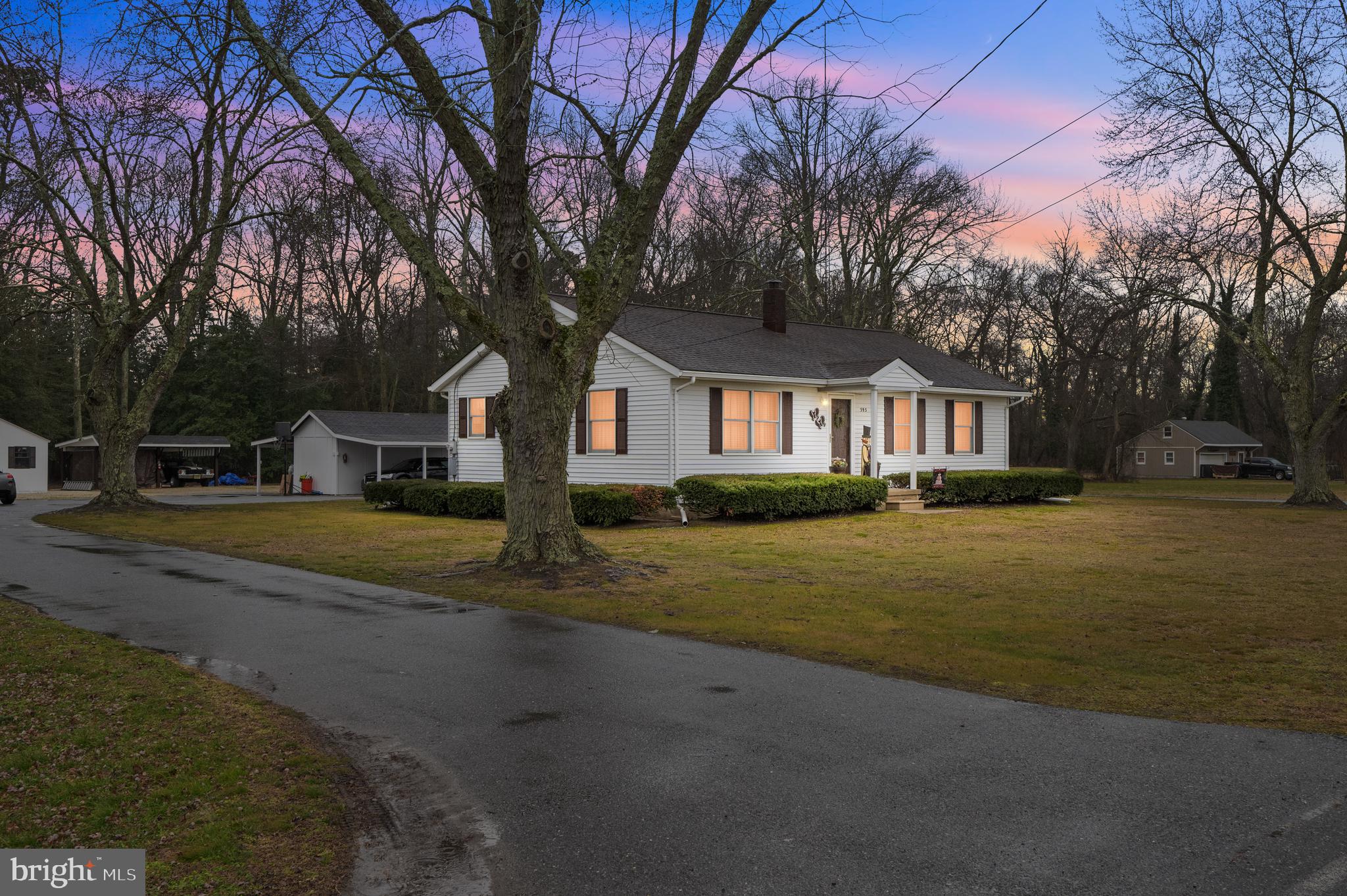 393 Newport Neck Road Newport, NJ 08345 - Photo 24 of 24 a view of house with outdoor space and trees in the background