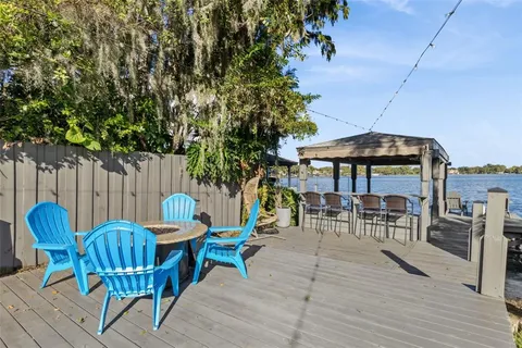 an outdoor space with furniture and umbrella
