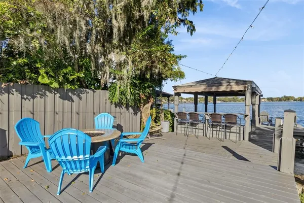 an outdoor space with furniture and umbrella