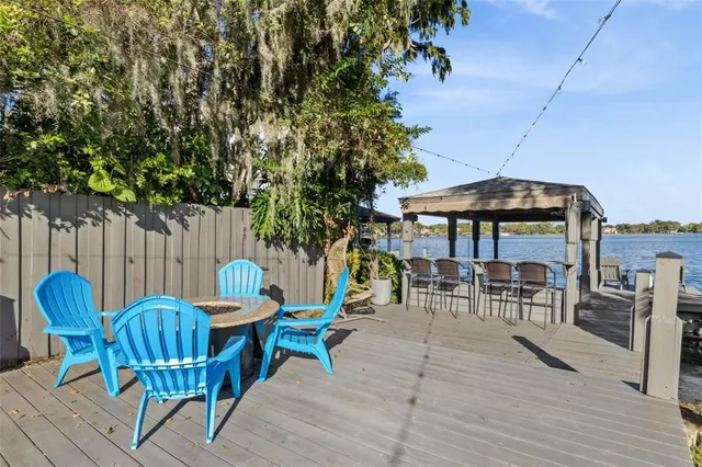 an outdoor space with furniture and umbrella