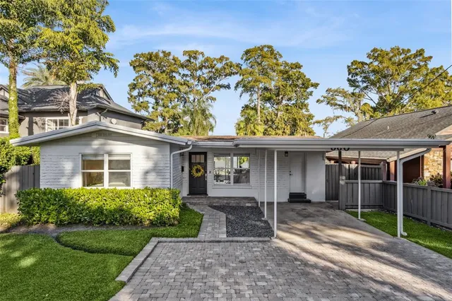 front view of a house with a garden