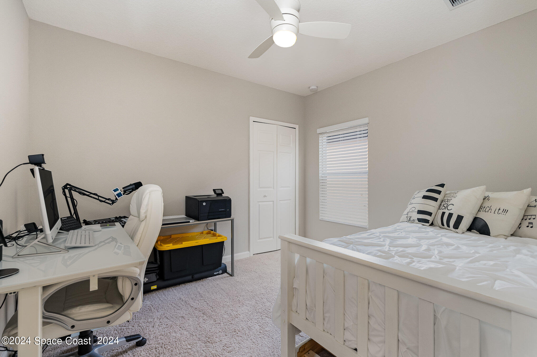 4210 Harvest Circle Rockledge, FL 32955 - Photo 17 of 24 a bedroom with bed and window