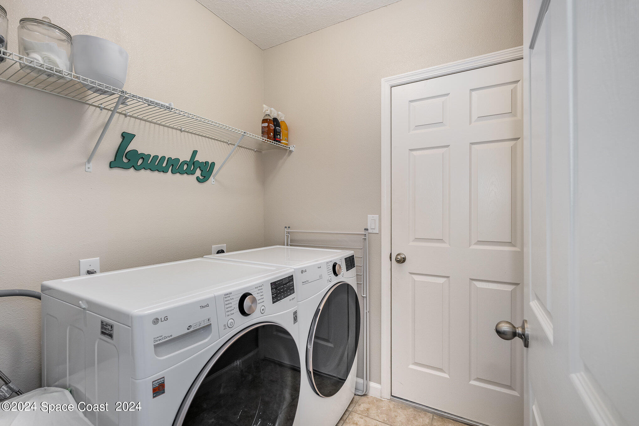 4210 Harvest Circle Rockledge, FL 32955 - Photo 21 of 24 a utility room with dryer and washer
