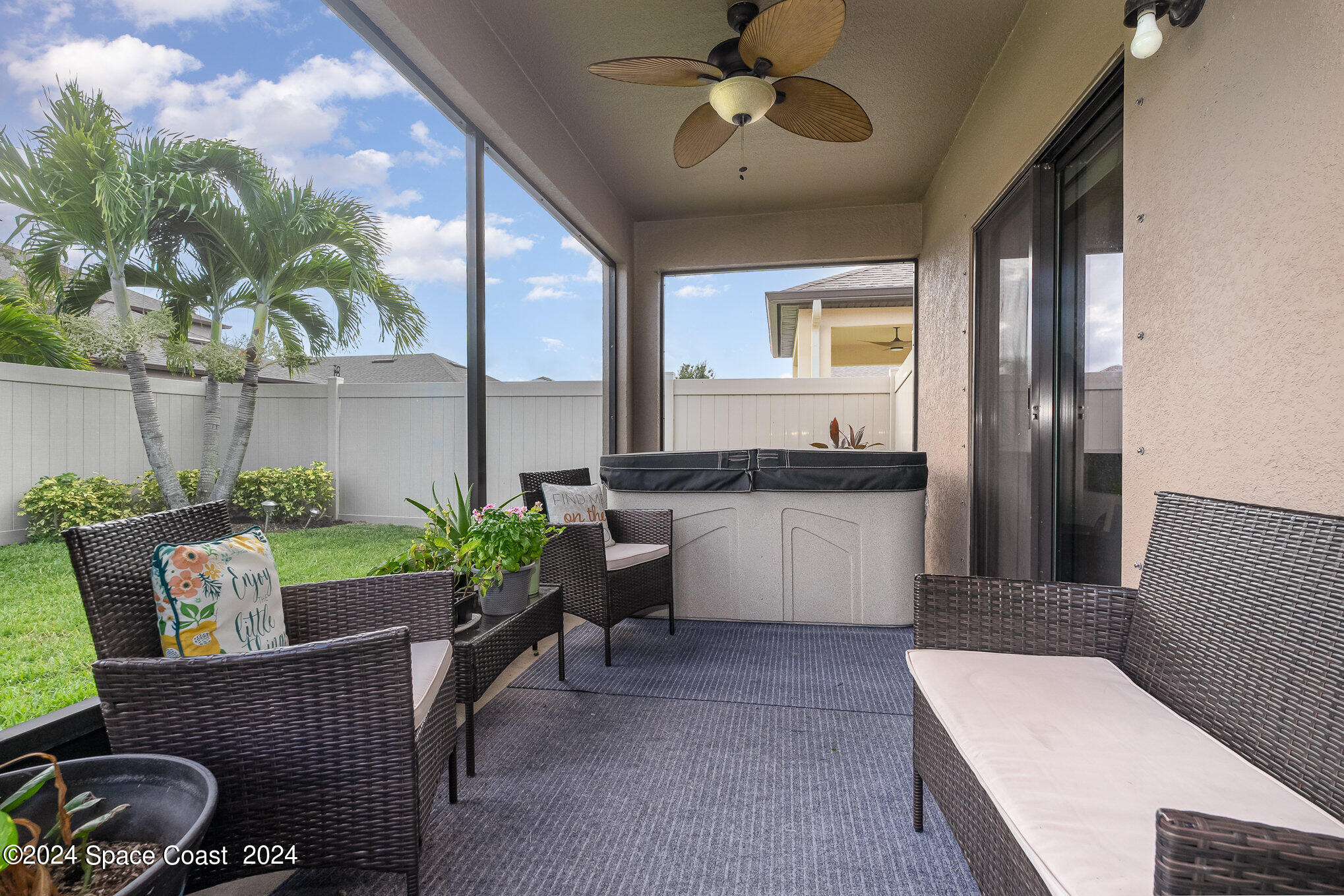 4210 Harvest Circle Rockledge, FL 32955 - Photo 22 of 24 a living room with furniture and a large window