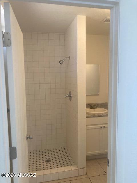 482 Avenida Papalote Rio Rico, AZ 85648 - Photo 7 of 8 a bathroom with a shower