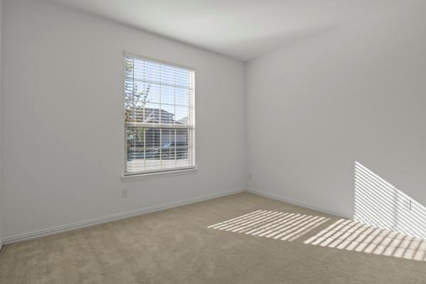 224 Cherryvale Lane Princeton, TX 75407 - Photo 14 of 28 a view of an empty room with a window