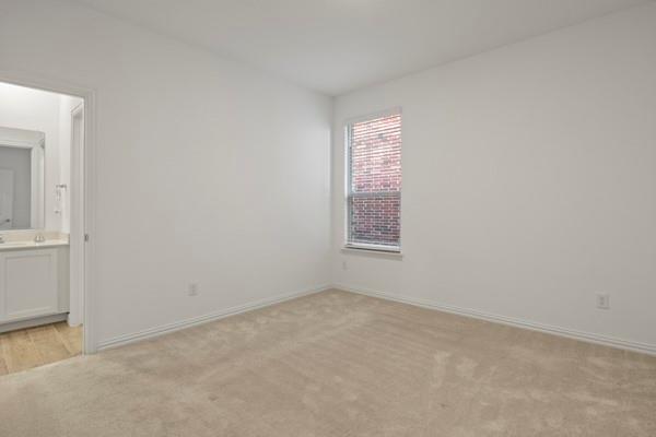 224 Cherryvale Lane Princeton, TX 75407 - Photo 20 of 28 an empty room with windows