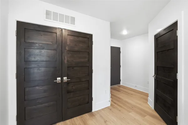 a bathroom with a shower and a tub