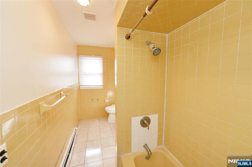 100 Eastern Way Rutherford, NJ 07070 - Photo 11 of 19 a bathroom with a shower