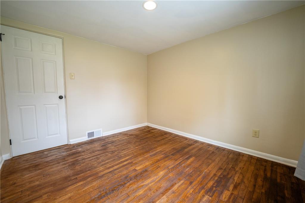 448 Whitestown Road Butler, PA 16001 - Photo 27 of 44 a view of empty room with wooden floor