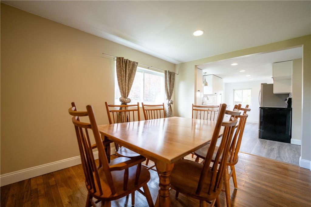 448 Whitestown Road Butler, PA 16001 - Photo 9 of 44 a view of a dining room with furniture and wooden floor