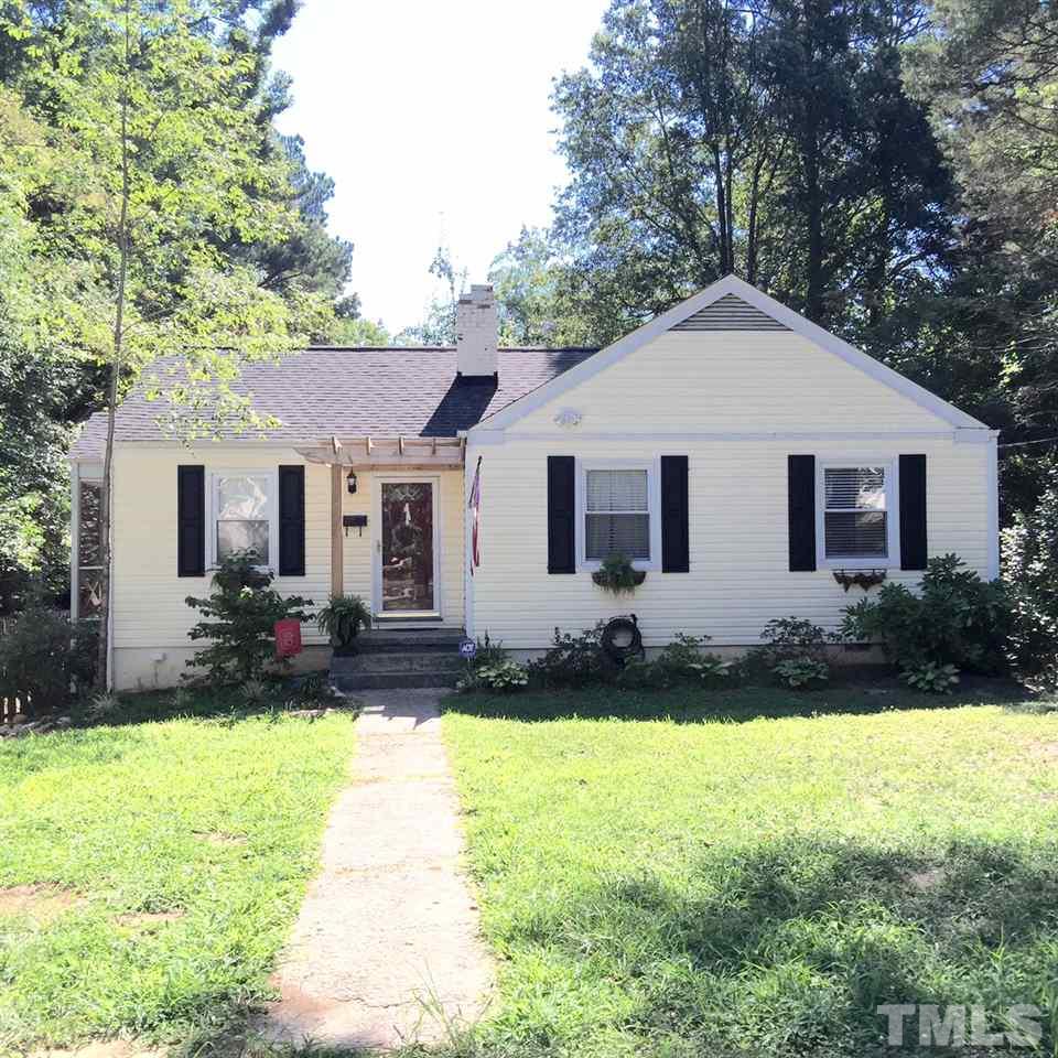 412 Colleton Road Raleigh, NC 27610 - Photo 1 of 19 a front view of a house with a yard outdoor seating and yard