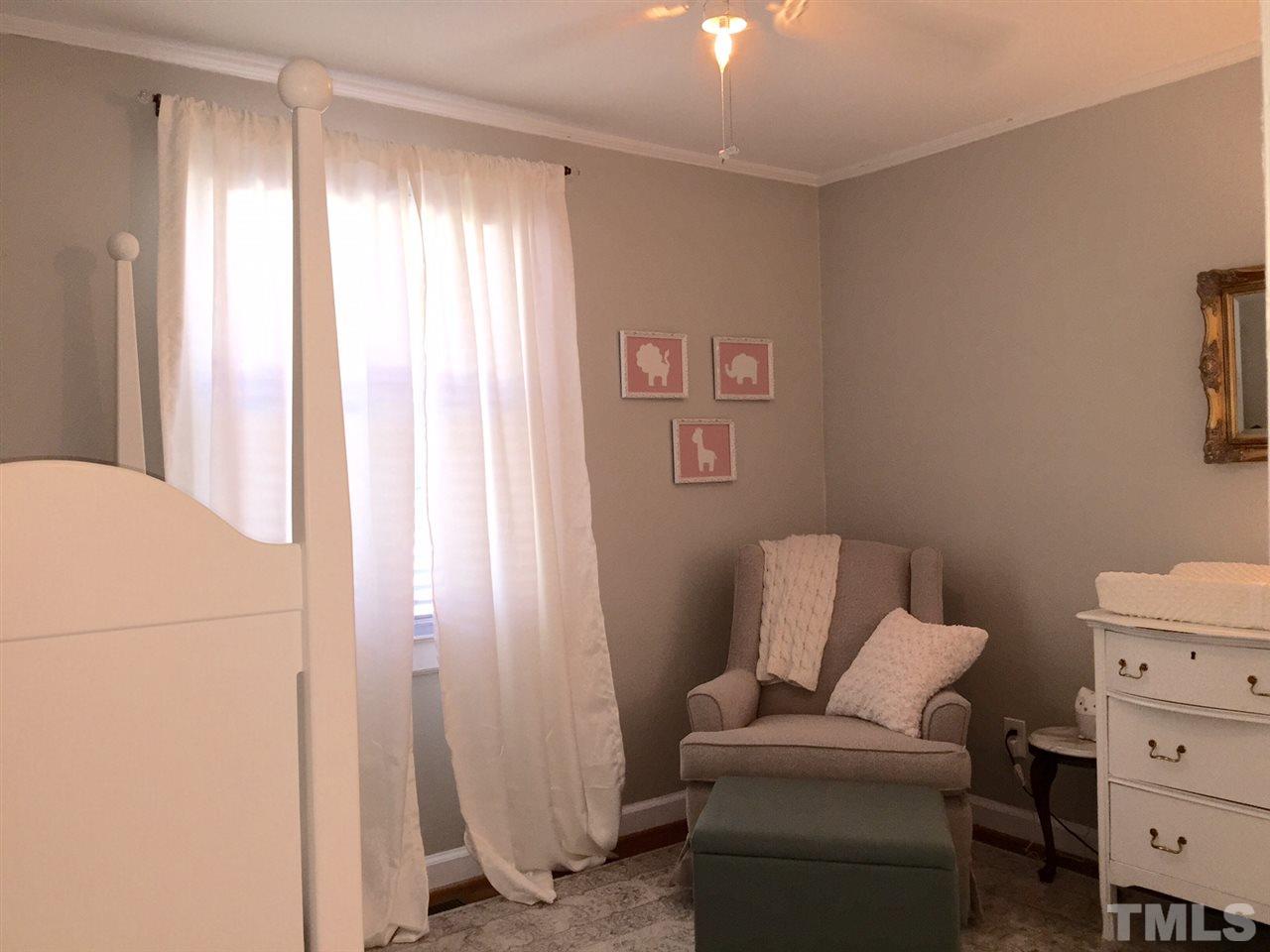 412 Colleton Road Raleigh, NC 27610 - Photo 15 of 19 a living room with furniture and a window