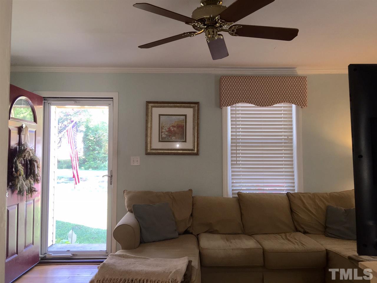 412 Colleton Road Raleigh, NC 27610 - Photo 3 of 19 a living room with furniture and a window