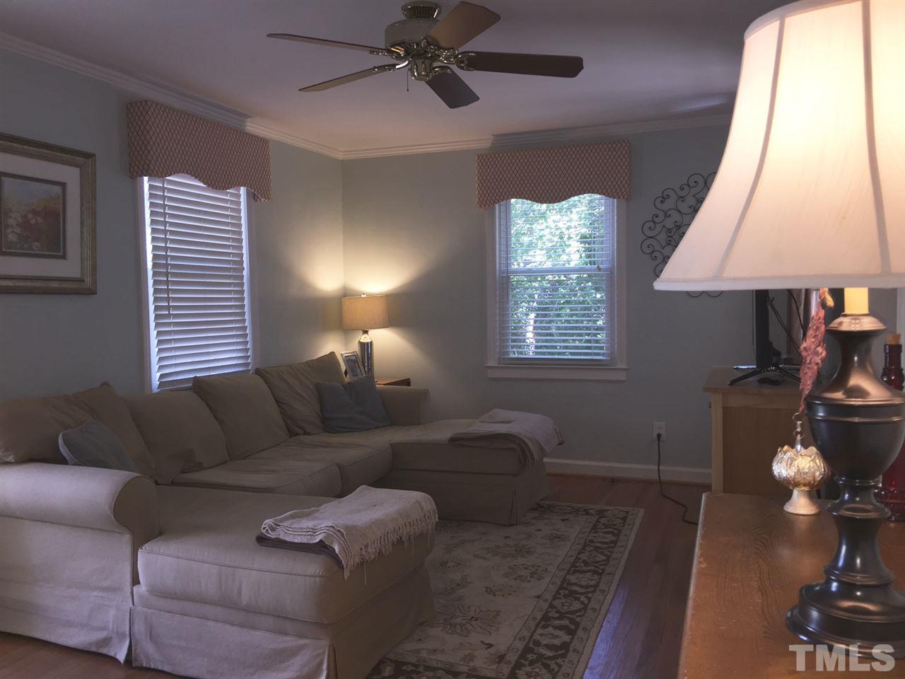 412 Colleton Road Raleigh, NC 27610 - Photo 4 of 19 a living room with furniture and a window