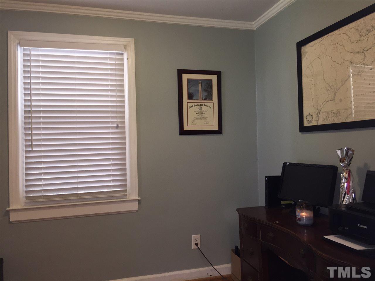412 Colleton Road Raleigh, NC 27610 - Photo 6 of 19 a view of a workspace with a window