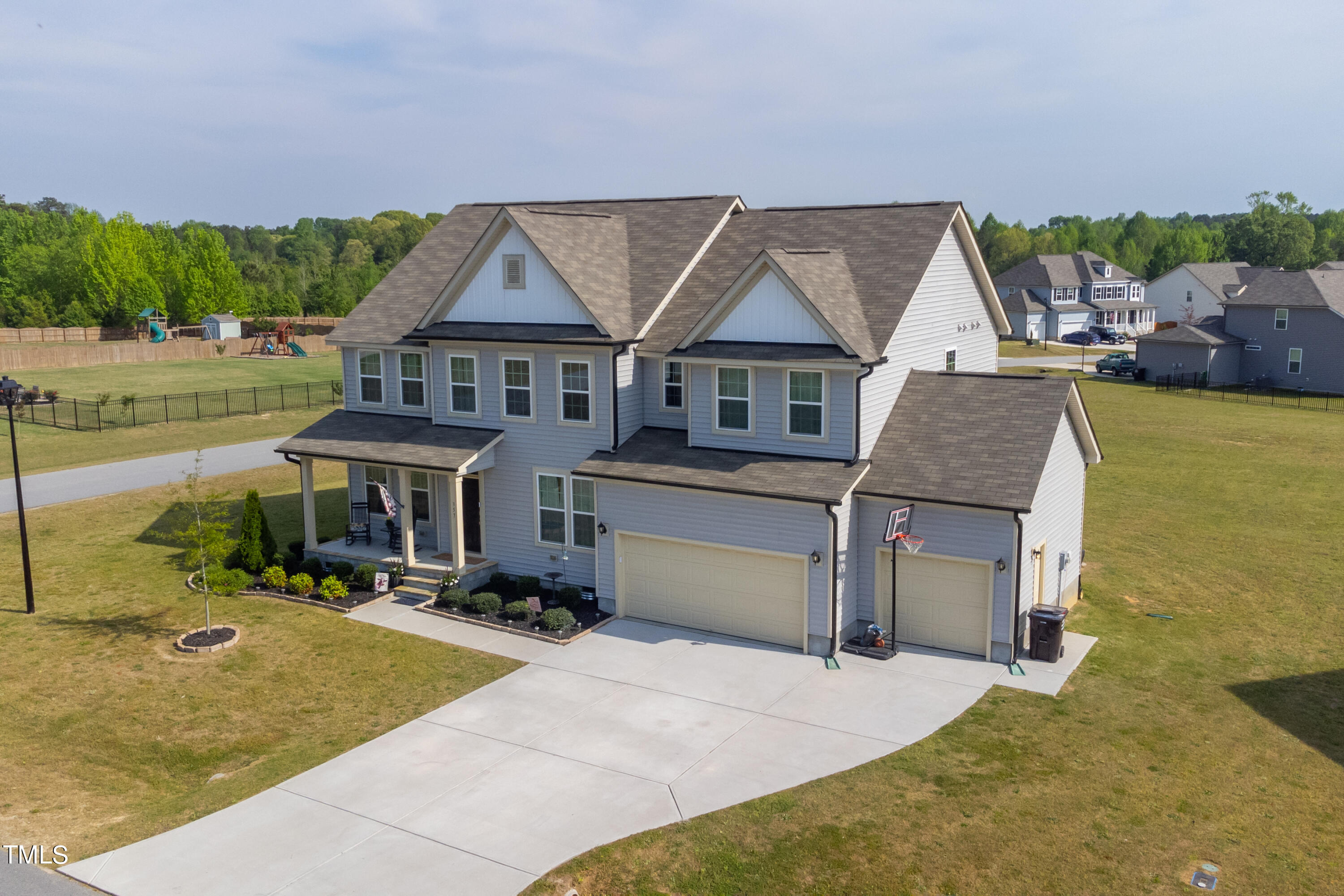 357 Sunrise Ridge Drive Willow Spring, NC 27592 - Photo 1 of 35 a view of a house with roof deck