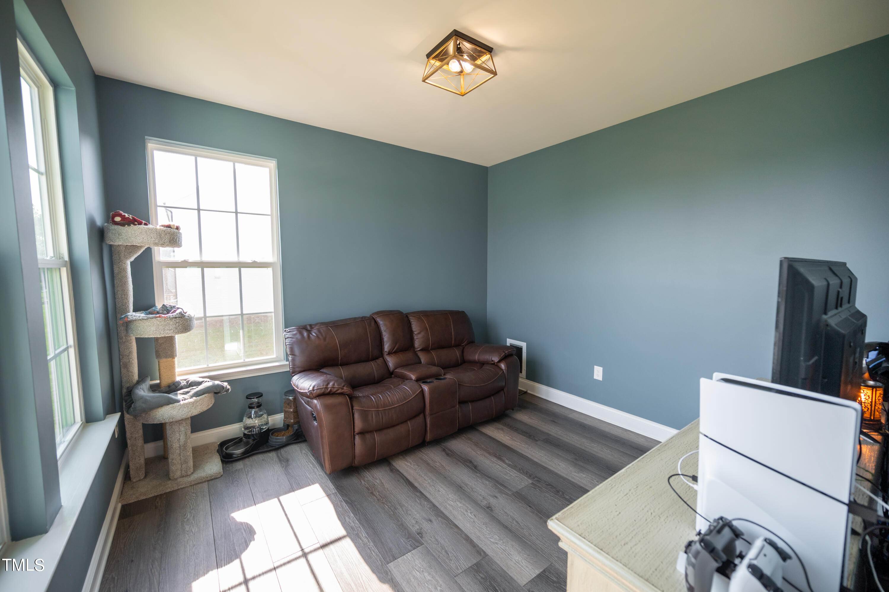 357 Sunrise Ridge Drive Willow Spring, NC 27592 - Photo 13 of 35 a living room with furniture and a window