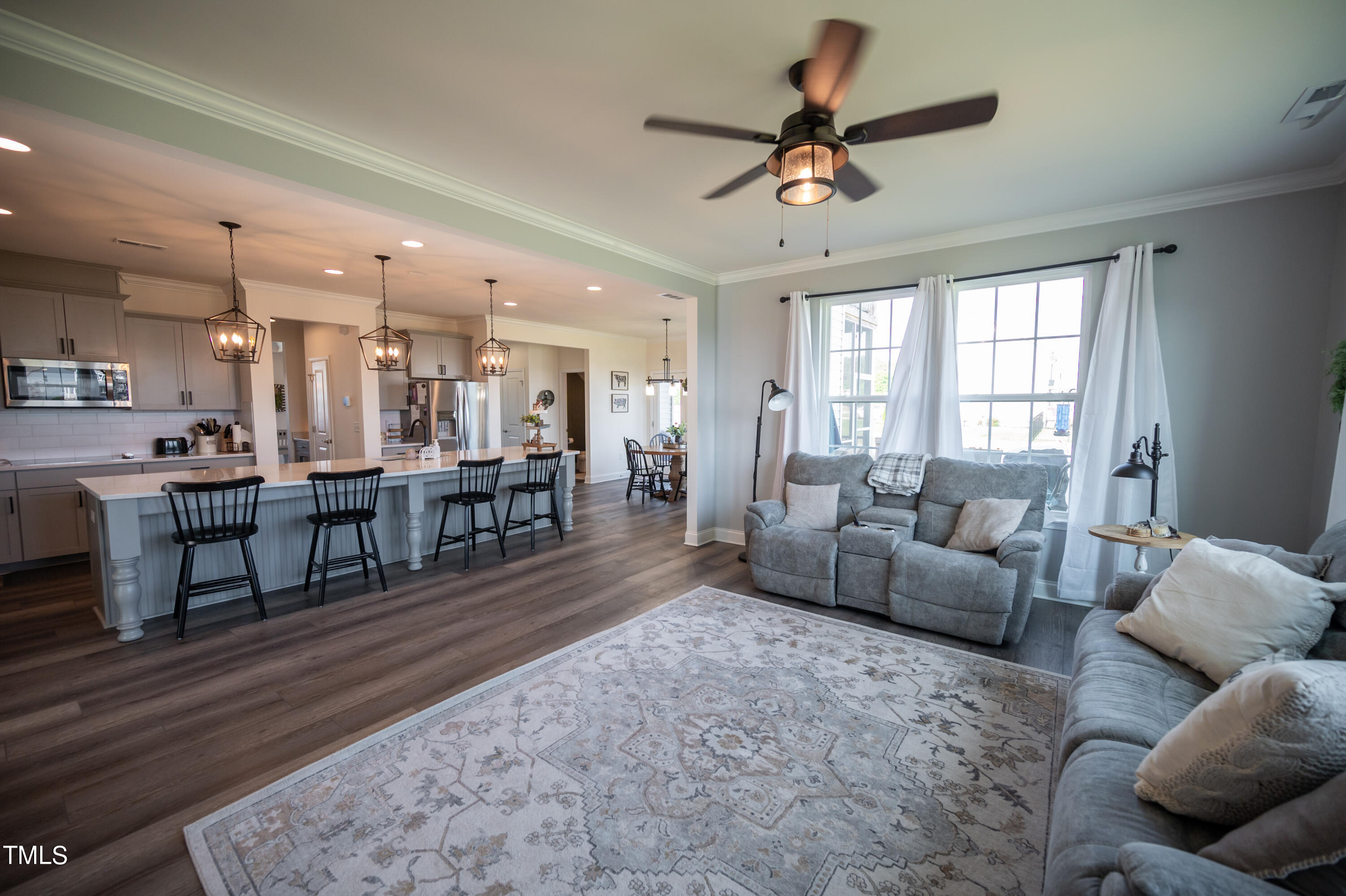 357 Sunrise Ridge Drive Willow Spring, NC 27592 - Photo 6 of 35 a living room with furniture and a table