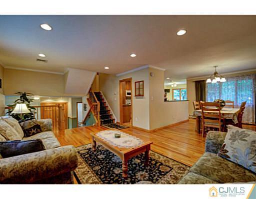 15 Warwick Road Edison, NJ 08820 - Photo 4 of 25 a living room with furniture and a wooden floor