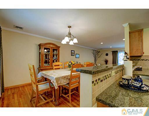 15 Warwick Road Edison, NJ 08820 - Photo 9 of 25 a view of a dining room with furniture