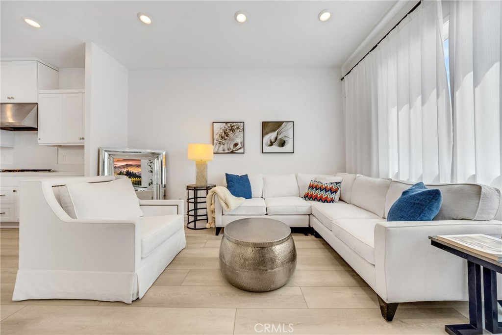 1109 Cadence Irvine, CA 92618 - Photo 3 of 12 a living room with furniture and a couch