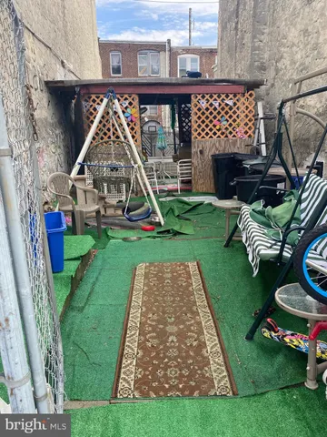 a view of a chair and table of the house
