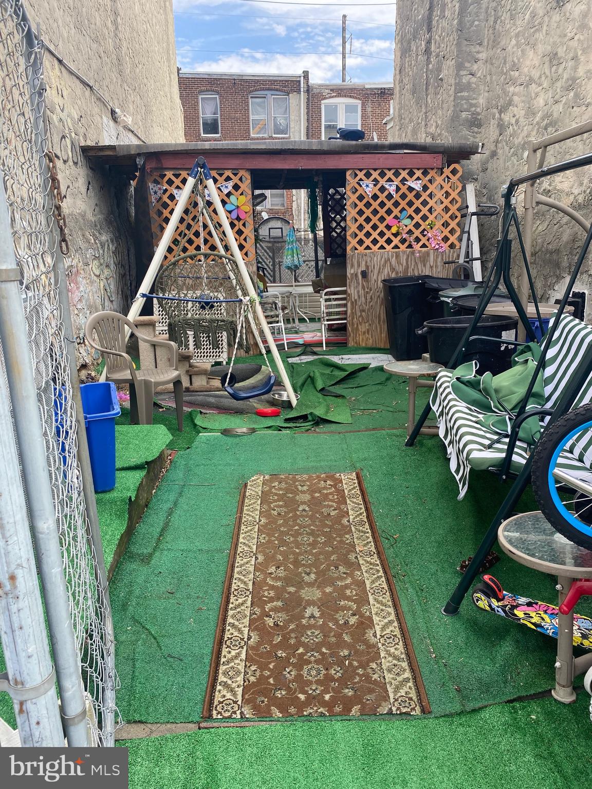 4829 North 7th Street Philadelphia, PA 19120 - Photo 2 of 4 a view of a chair and table of the house