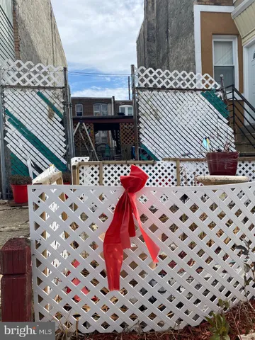 a view of balcony with wooden floor