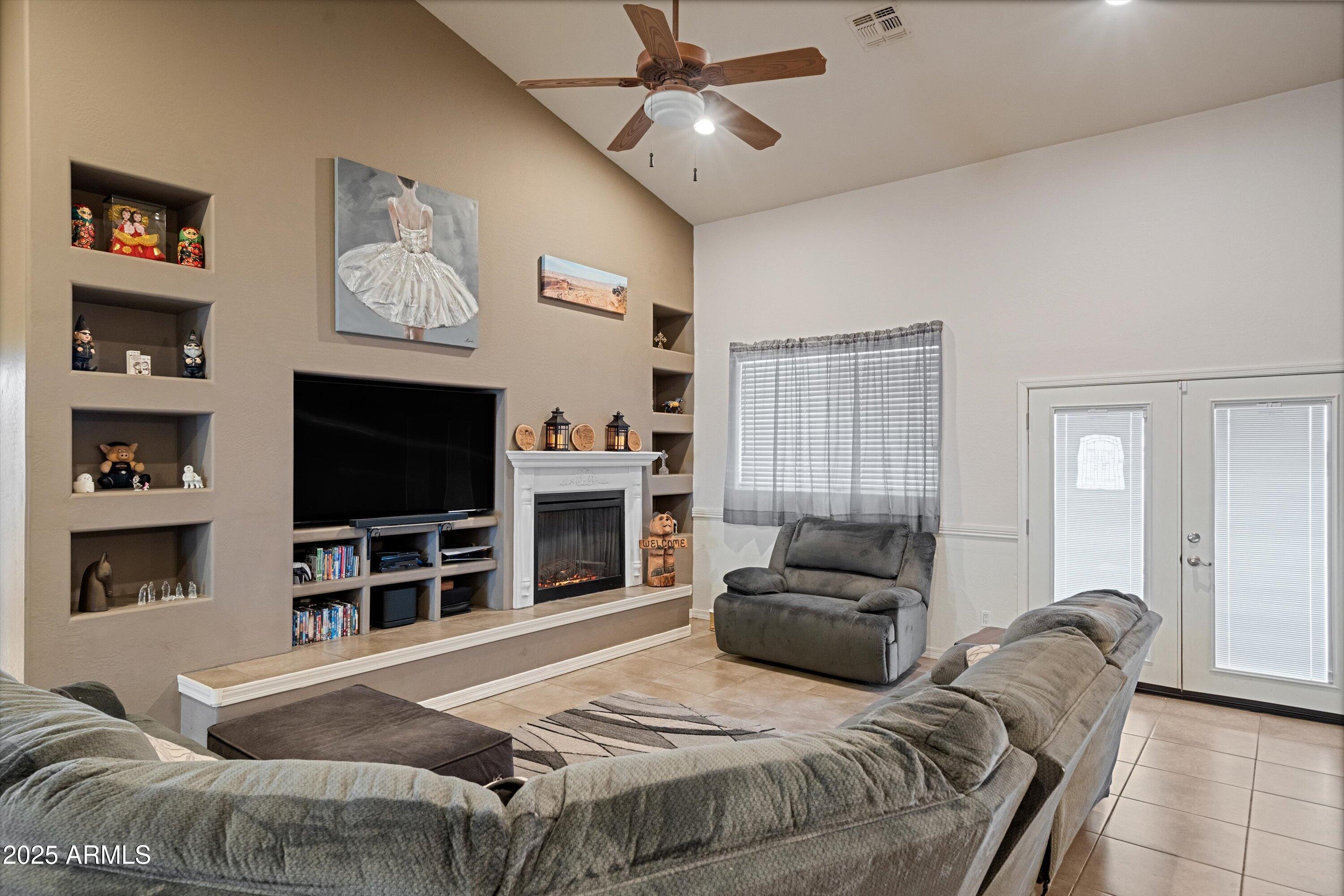 35947 West Buckeye Road Tonopah, AZ 85354 - Photo 11 of 54 a bedroom with a bed and a flat screen tv